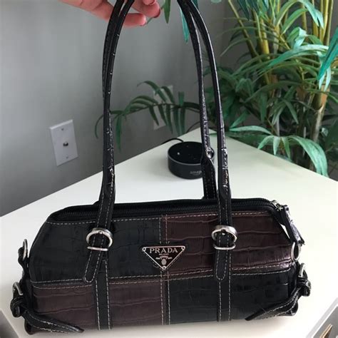 do any real vintage prada bags have on name zippers|authentic Prada handbags.